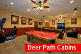 Cabin with Pool Table and Race Car Arcade Games
