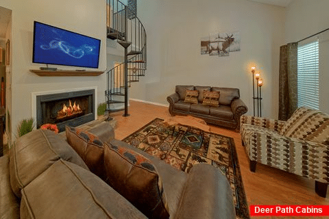 Living room with Fireplace in condo - Hearthstone