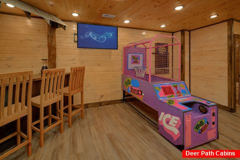 Cabin game room with basketball arcade and darts - Ain't Life Grand
